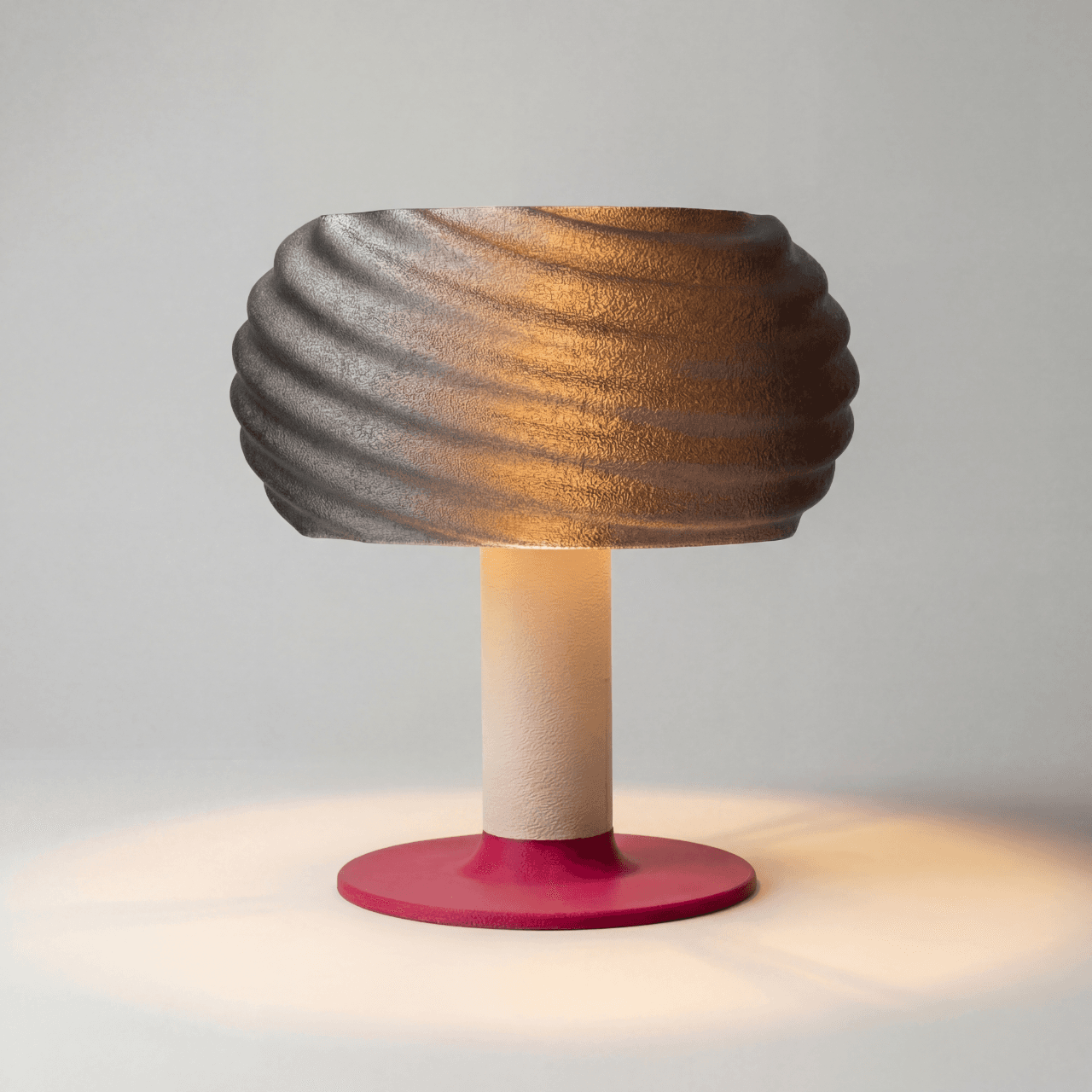 Detail view of Mira wavy lamp featuring white spiral shade and pink base